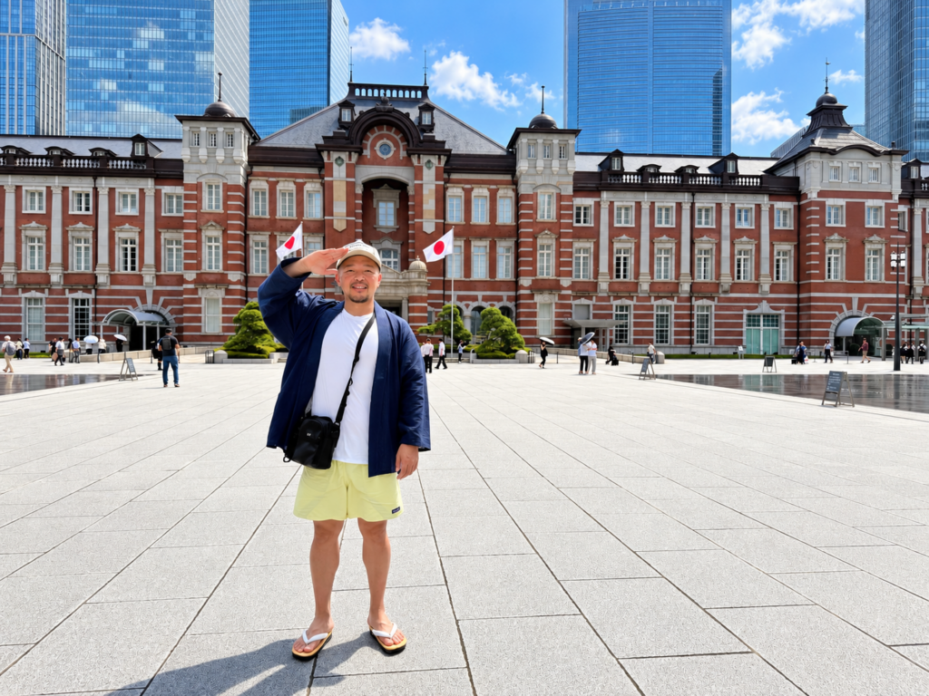 Samurai Guide Sho in front of Tokyo Station on a sunny day